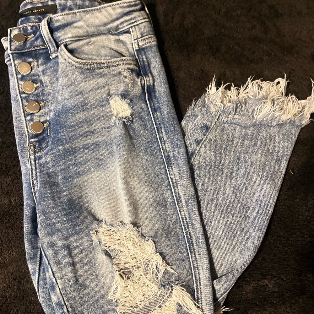 Mid rise distressed jeans